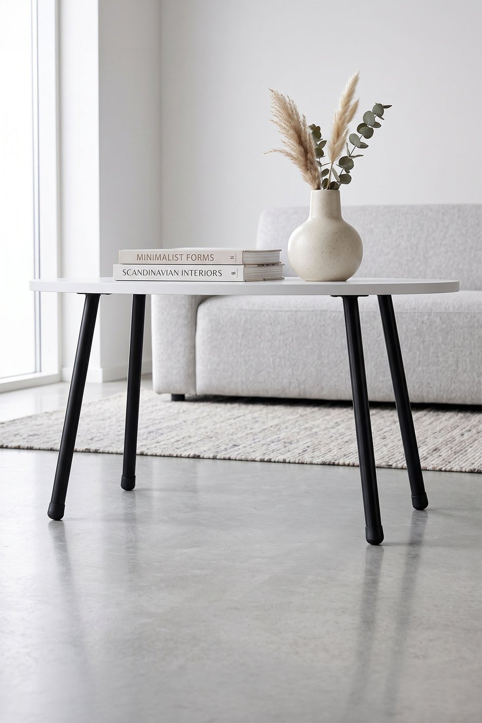 Ovaler Couchtisch mit Metallbeinen 2